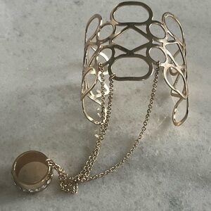 Avon Gold Tone Hand Chain Adjustable Cuff with attached Ring